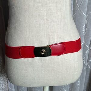 VINTAGE Anne Klein red stretch belt with gold buckle.